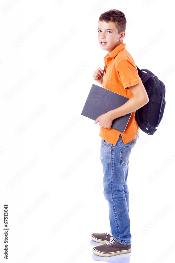 Portrait of a smiling school boy with backpack holding a noteboo Portrait of a smiling school boy with backpack holding a noteboo