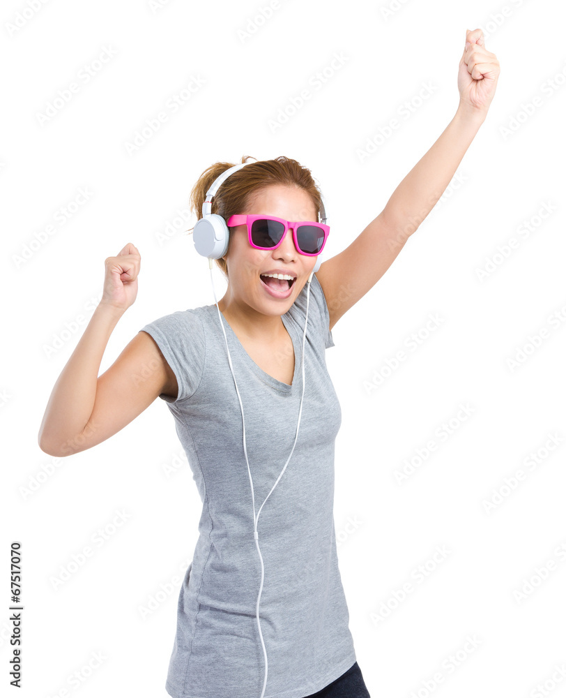 Excited woman with headphone