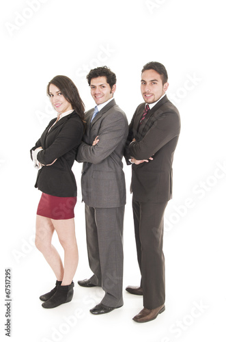 two latin businessmen and a businesswoman in suits posing