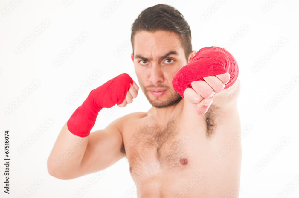 hispanic martial arts fighter wearing red shorts and wristband hispanic martial arts fighter wearing red shorts and wristband
