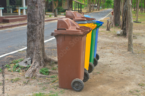 Different colorful recycle bins