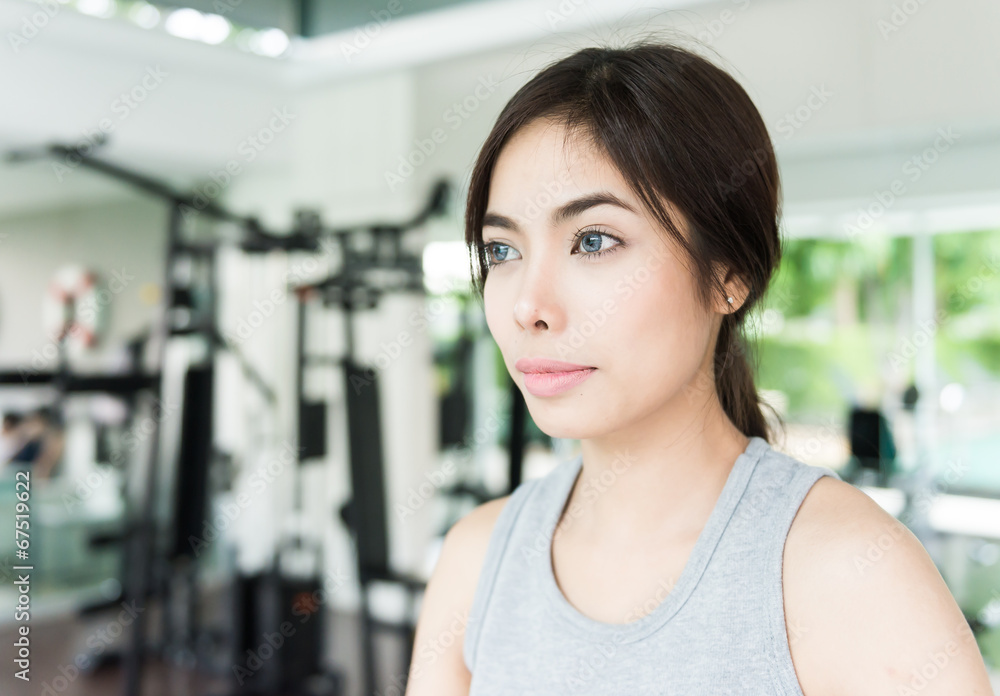 Fototapeta premium Woman workout at fitness
