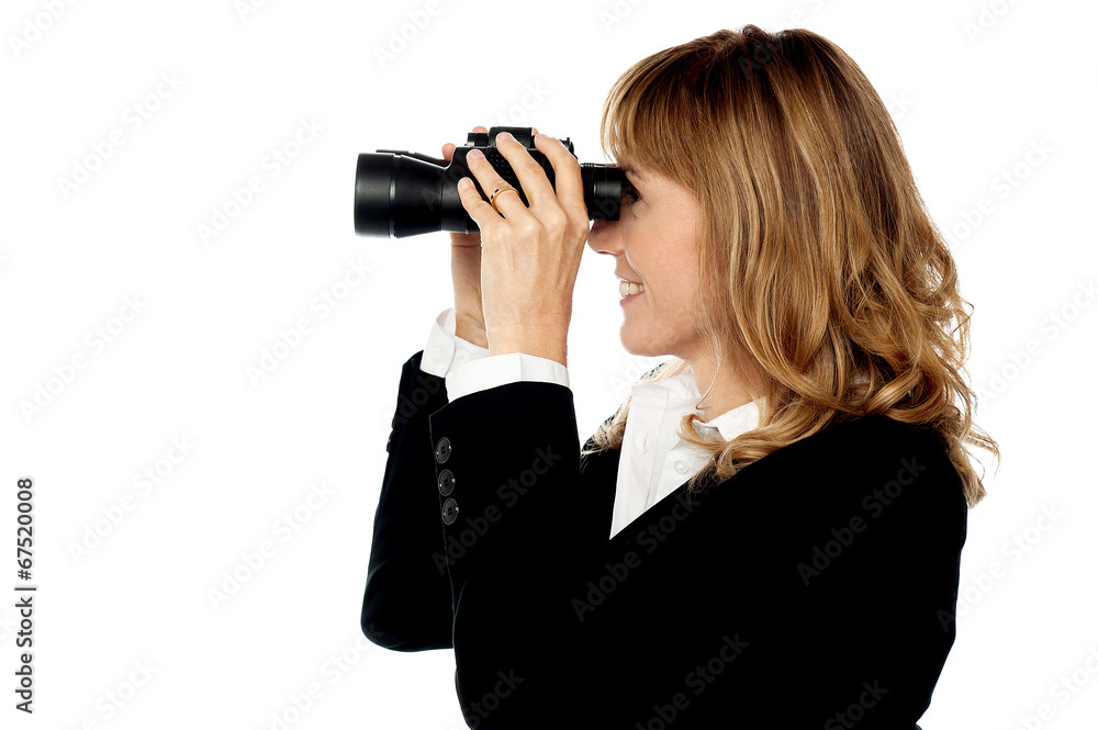Attractive woman viewing through binocular Attractive woman viewing through binocular