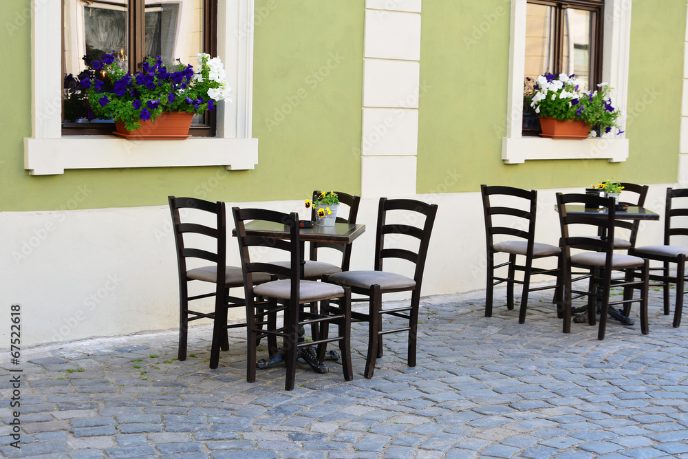 Outdoor street cafe tables and chairs