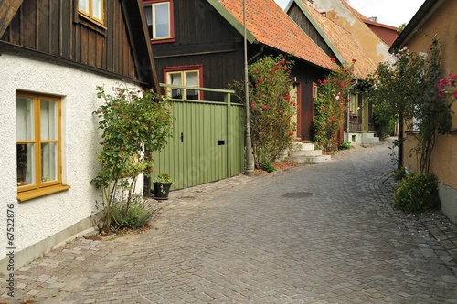 Street with old houses in a Swedish town Visby