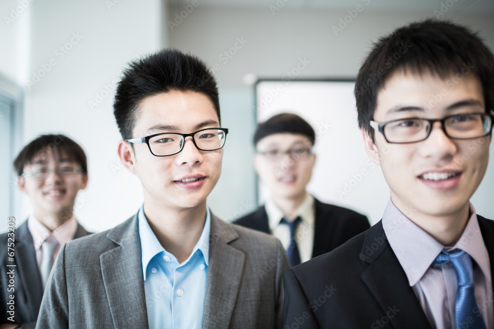 Group of business people with businessman leader on foreground Group of business people with businessman leader on foreground