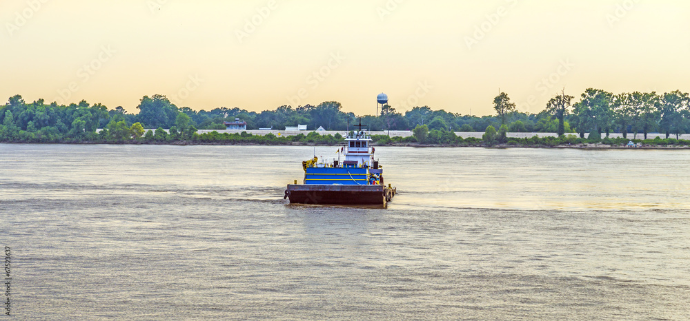 Ferry crossing Mississippi river at sunset in Baton Rouge
