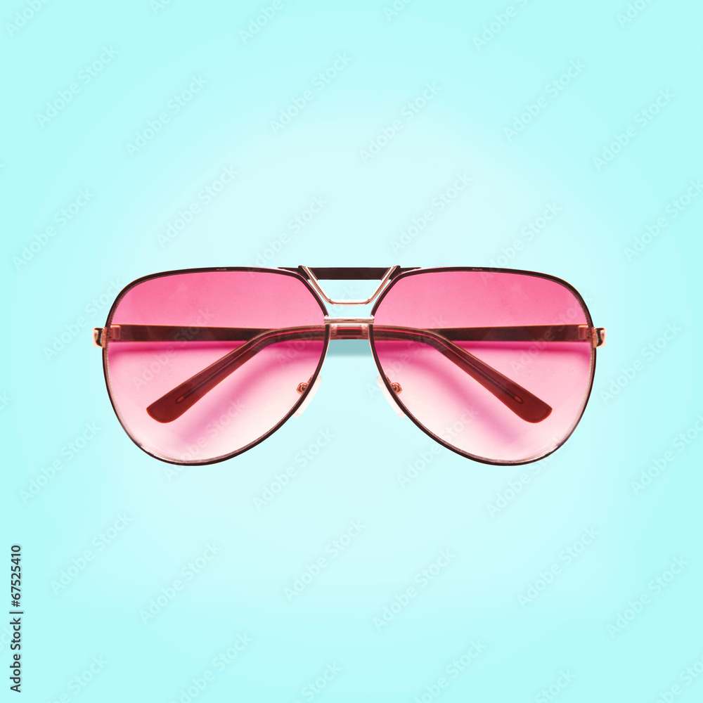 Pink sunglasses blue background Pink sunglasses blue background