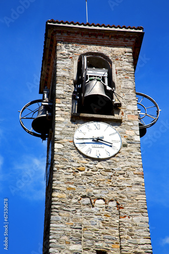 besnate old   wall  and church tower bell sunny day photo