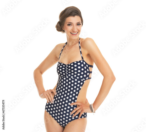 Portrait of smiling young woman in swimsuit © Alliance