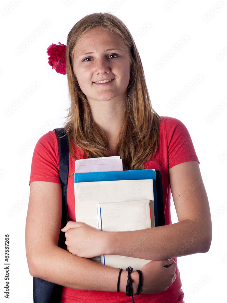 Young female teenage student carrying books Young female teenage student carrying books