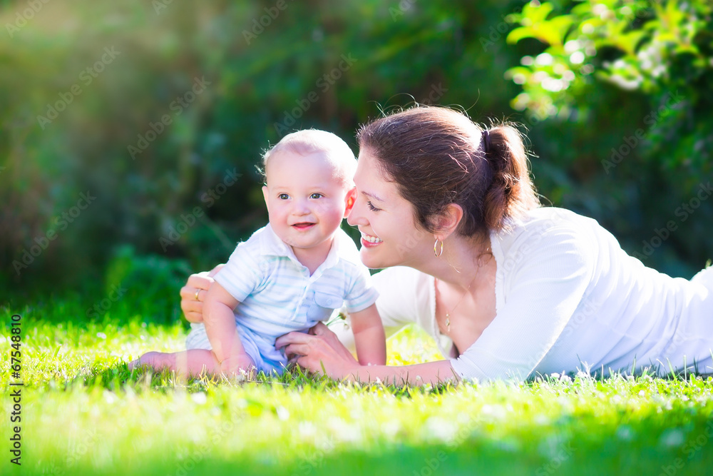 Mother and sweet baby in the garden Mother and sweet baby in the garden