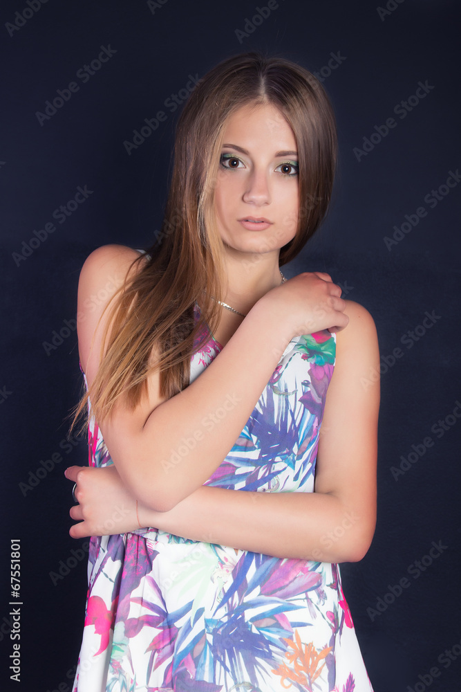 beautiful girl with long hair in a white dress with flowers beautiful girl with long hair in a white dress with flowers