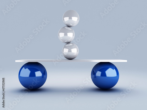 white spheres in equilibrium. balance concept