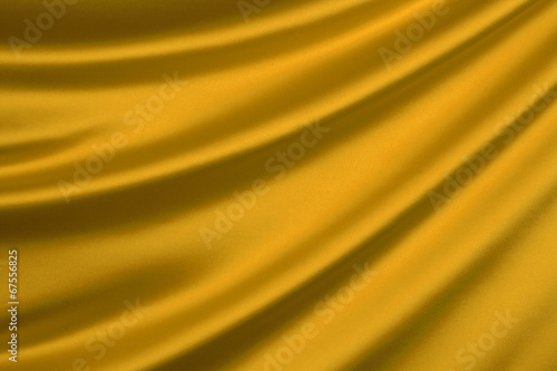 Gold silk textile background with copy space
