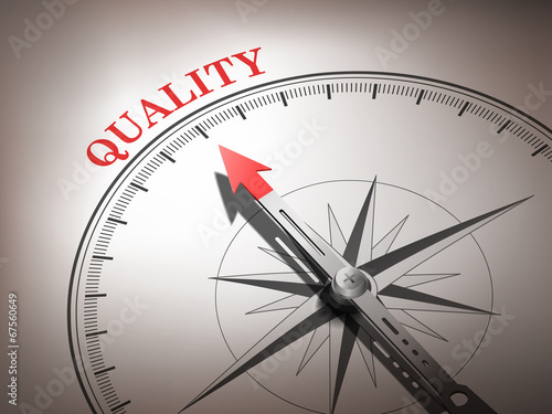 abstract compass with needle pointing the word quality