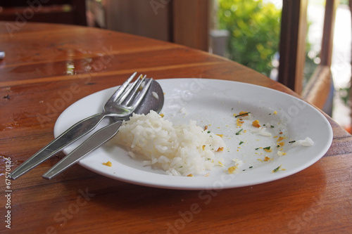 Obraz na plátně food leftover on plate with spoon and fork