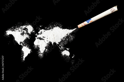 Powder drug like cocaine in the shape of the world.(series) photo