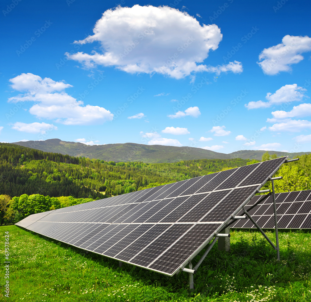 Solar energy panels in spring landscape