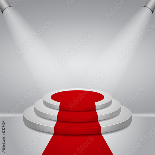 Illuminated round stage podium with red carpet