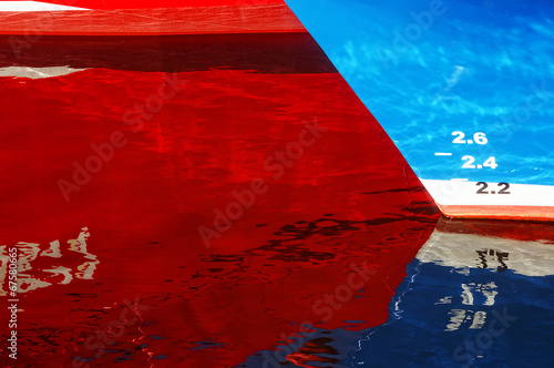 abstraction with ship reflections on water