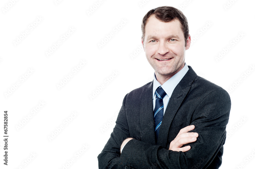 Cheerful businessman with arms folded Cheerful businessman with arms folded