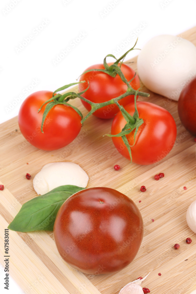 Tomatoes and mozzarella balls. Tomatoes and mozzarella balls.