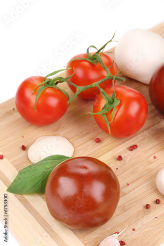 Tomatoes and mozzarella balls.