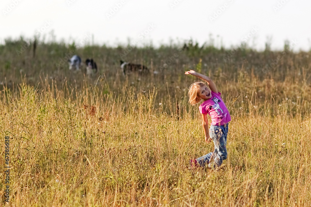 Girl playing with a Border Collie