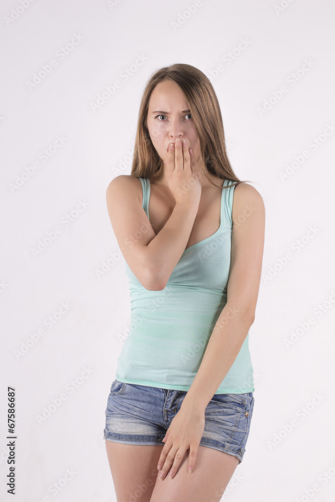 shocked and frightened young woman shocked and frightened young woman