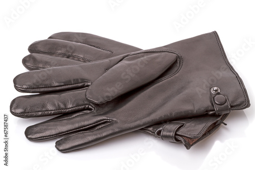 Black leather gloves on white