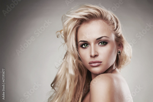 Fashion portrait of young beautiful woman.Sexy Blond girl