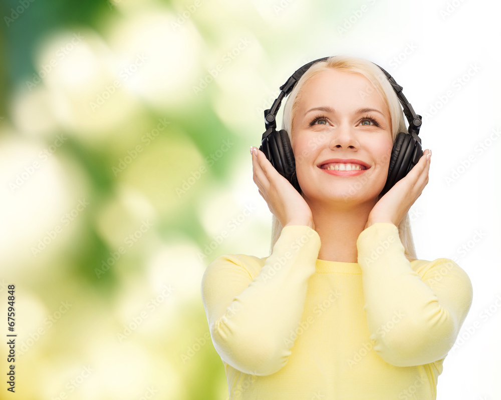 smiling young woman with headphones smiling young woman with headphones