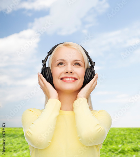 smiling young woman with headphones