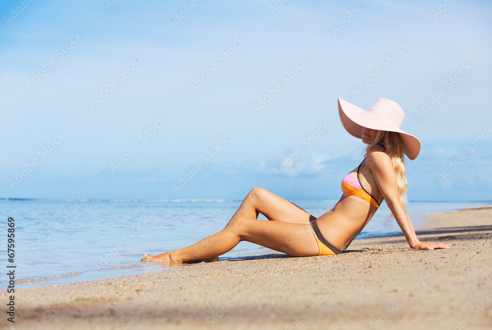 Woman relaxing on tropical beach