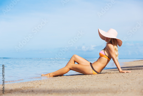 Woman relaxing on tropical beach