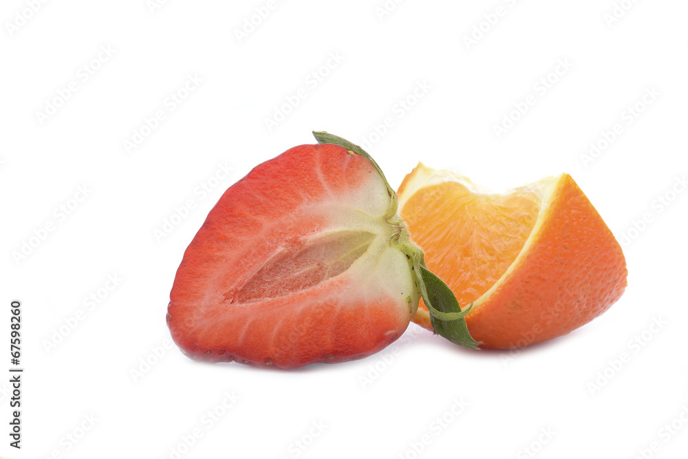 Strawberries and tangerine isolated on white background