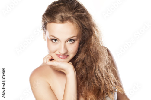 smiling young blonde with questionable gesture