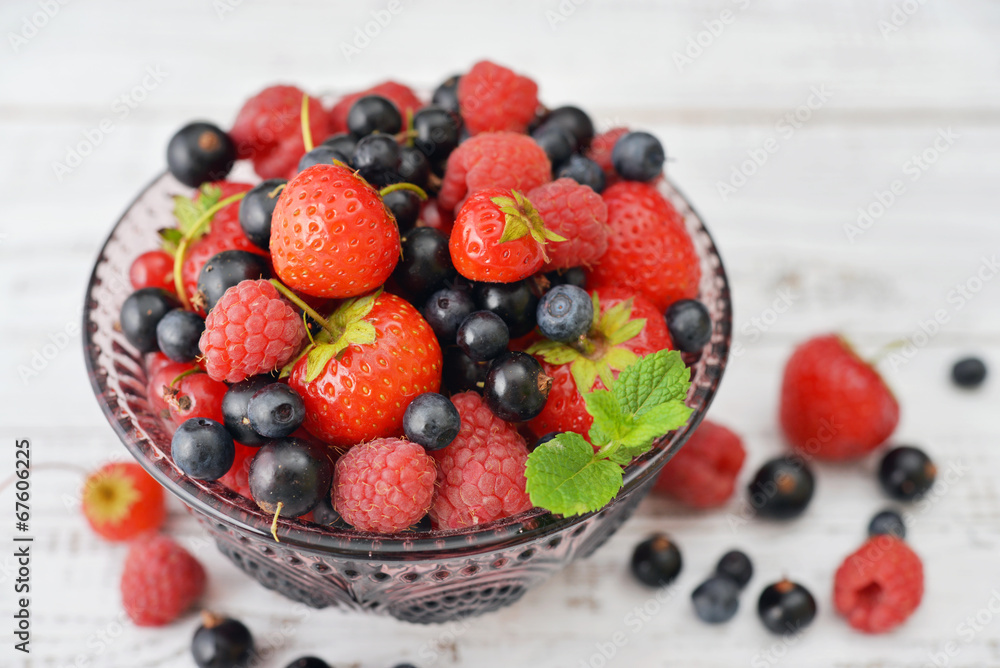 Berries in glass vase