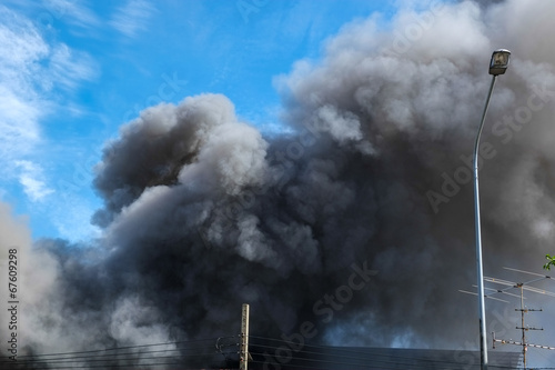 Black smoke and blue sky