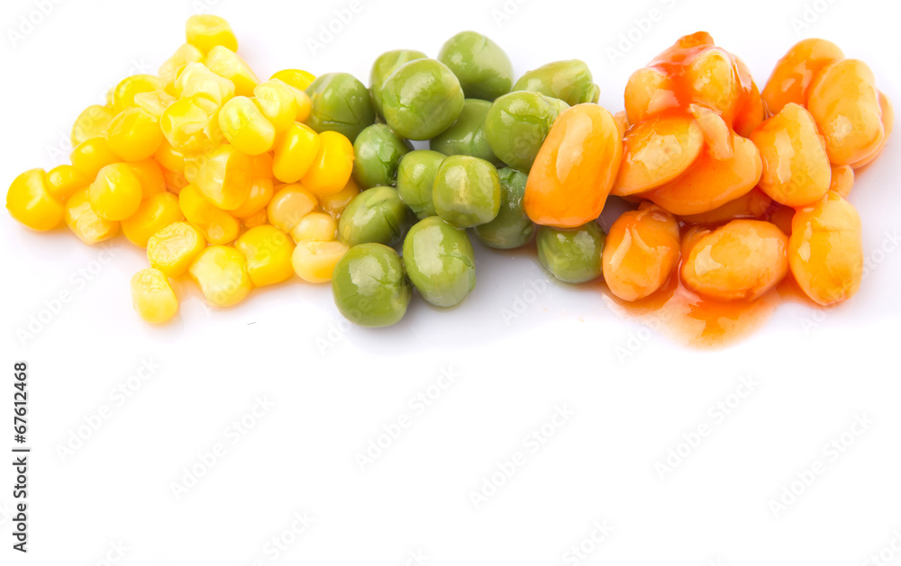 A group of baked beans, green peas and sweet corn over white A group of baked beans, green peas and sweet corn over white