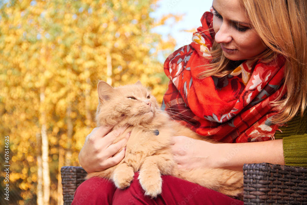 young girl with cat on natural background young girl with cat on natural background
