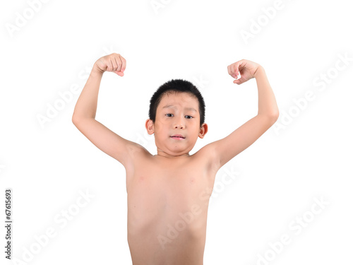 Thin boy showing his muscles isolated on white background Stock Photo