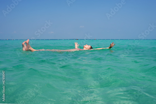 woman enjoy swimming in the sea