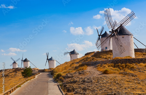 Ancient windmills in the sunny summer day, Konsuegra, Spain