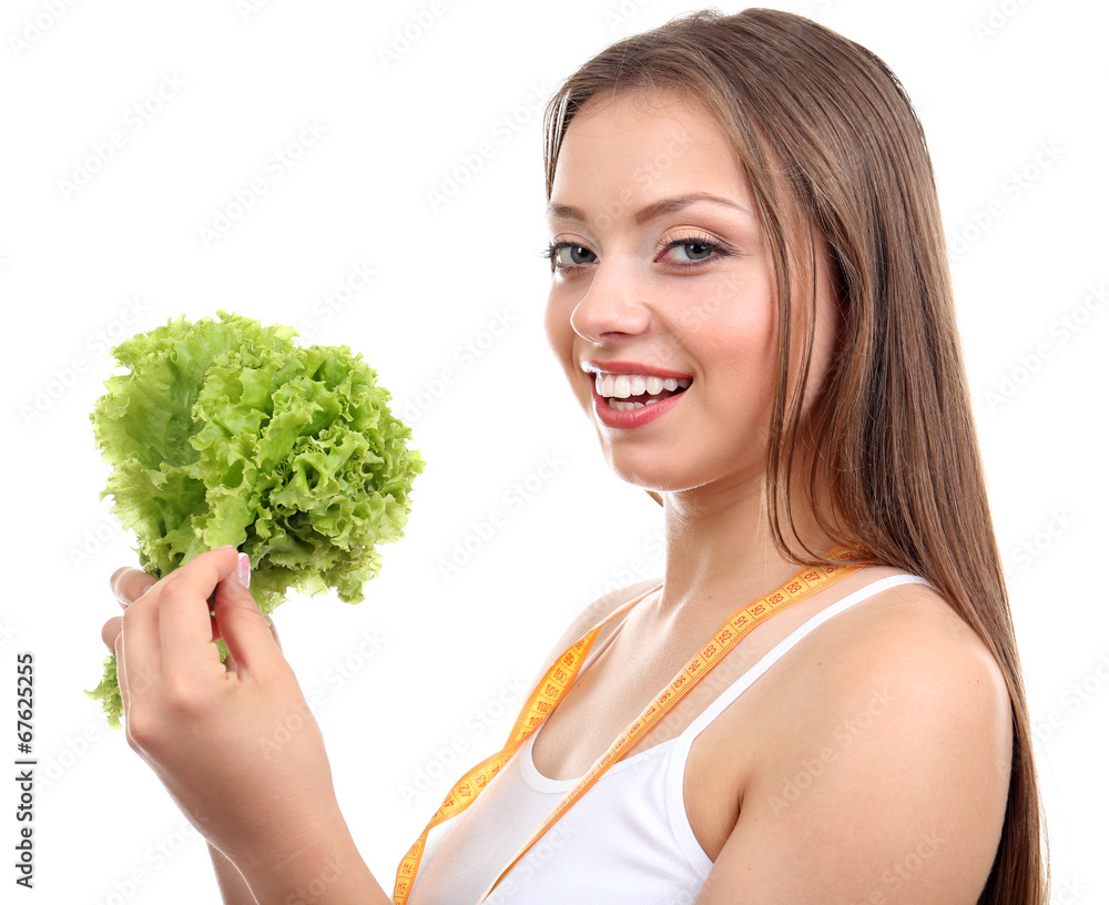 Beautiful girl with lettuce and measuring tape, isolated Beautiful girl with lettuce and measuring tape, isolated
