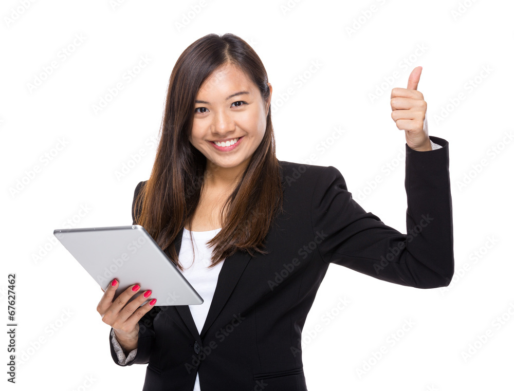 Asian business woman with tablet and thumb up Asian business woman with tablet and thumb up
