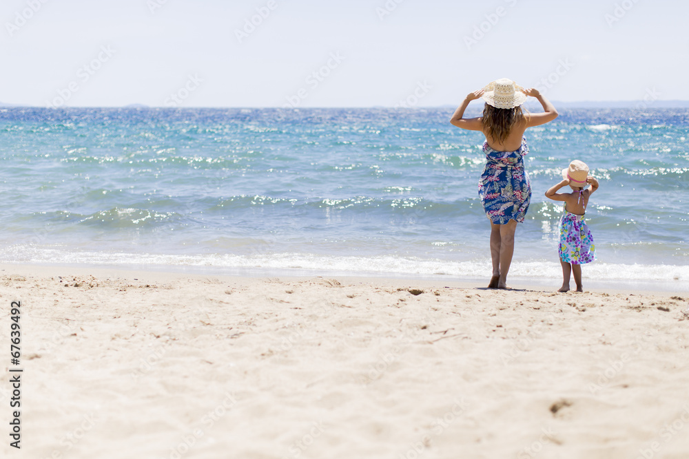 Mother and daughter on the beach