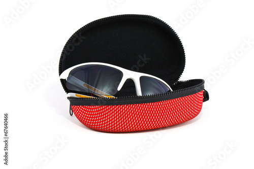 Sport sunglasses and case on a white background