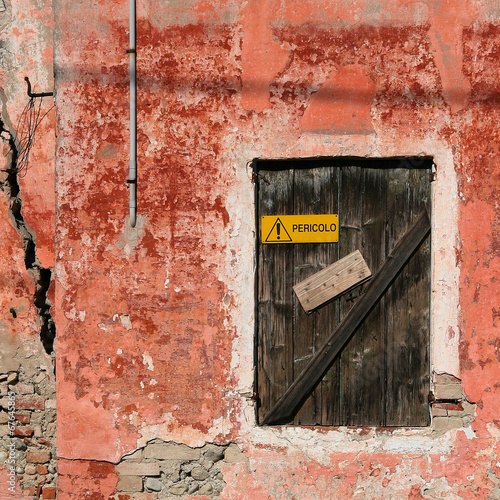 Photography Old red decadent wall with a closed window